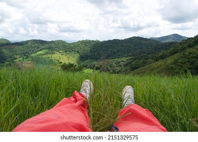 Lying On The Grass With Moutain View