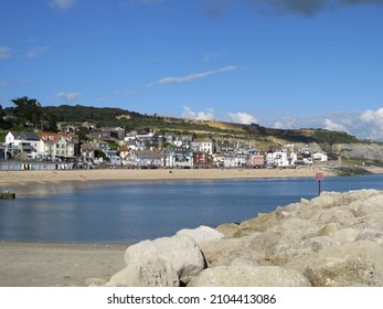 Lyme Regis England - September 25 2014: view the historic seaside town of Lyme Regis also known as The Pearl of Dorset	across the sea