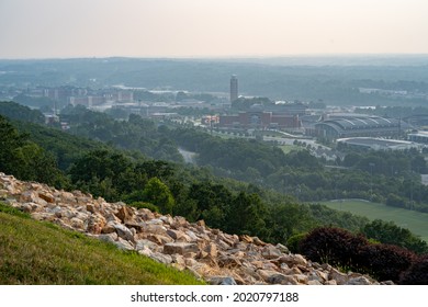 LYNCHBURG, UNITED STATES - Jul 21, 2021: The Liberty University in Lynchburg, Virginia from LU monogram hiking trail, haze covering the city from the west coast forest fires