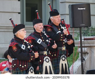 Lynchburg, Virginia USA - September 10, 2021: The bagpipers of the Lynchburg Police Department ready to play at 9-11 commemorative ceremony held at Lynchburg's Monument Terrace on September 10, 2021.