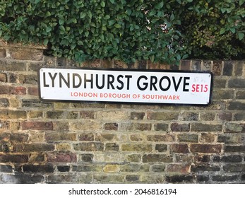 Lyndhurst Grove London SE15 UK. September 23 2021.Typical London street sign set against a textured brick wall background here located at Lyndhurst Grove in the Peckham district of London.
