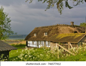 Lyo, Denmark - July 4th, 2012 - Traditional timber-framed thatched Danish farmhouse on the island of Lyo in the Baltic