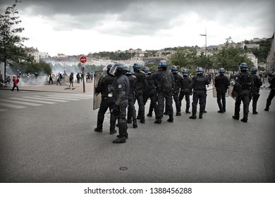 Lyon, FRANCE - 05/04/2019 : Several hundred yellow vests demonstrated in conjunction with Youth for Climate march. A week before the national mobilization in Lyon, some clashes took place with police. - Shutterstock ID 1388456288