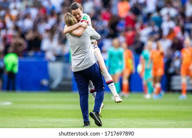 LYON, FRANCE - 7 JULY, 2019: Jill Ellis Head Coach Of USA Hugs Rose Lavelle After The 2019 FIFA Women's World Cup Final Match Between USA And Netherlands.