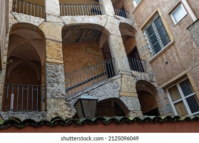 LYON, FRANCE, February 16, 2022 : Traditional architecture and staircase in old Renaissance buildings in the Vieux-Lyon district.