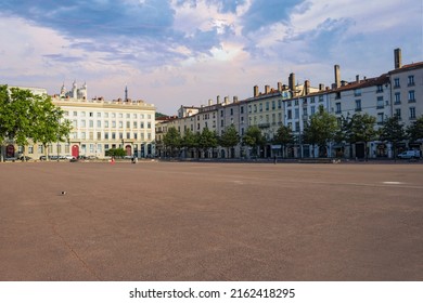 Lyon, France - May 22 2022: view of the equestrian statue of louis xiv and the basilica of notre dame de fourviere from place bellecour, in the center of lyon