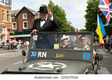 Lytham, Lancashire, UK. August 21, 2022. 1940s Weekend. Winston Churchill Lookalike Heading Vehicle Parade. V For Victory Sign And Cigar.