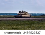 M1 Abrams tank in use during the war in Ukraine, showcasing modern military technology and battlefield deployment.