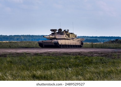 M1 Abrams tank in use during the war in Ukraine, showcasing modern military technology and battlefield deployment.