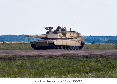 M1 Abrams tank in use during the war in Ukraine, showcasing modern military technology and battlefield deployment.