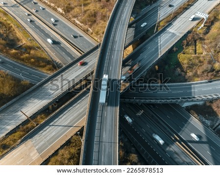 M1 and M25 UK Motorway Interchange Rush Hour Aerial View