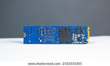 M2 SSD flash hdd hard disc drive memory computer isolated white and grey background and kept Horizontal . Pc hardware componet data storage electronics 