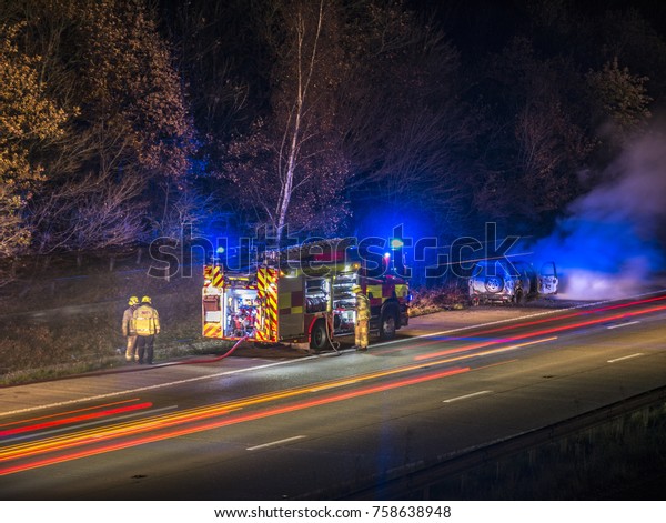 M20 J8-9 SOUTHBOUND, KENT, UK- 19 NOVEMBER\
2017: Fire crews work on Vehicle fire on the hard shoulder of the\
M20 between Ashford and\
Maidstone.