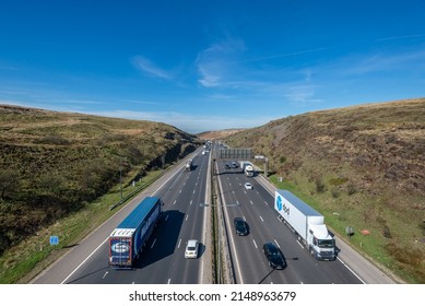M62 Motorway , Lancashire-England - 21.04.2022 - Overhead view of the M62 Motorway junction 22 looking west towards Rochdale and Bury
