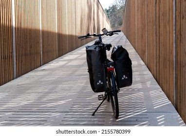 Maasmechelen, Limburg, Belgium - 04 12 2022 - Trekking Bike At A Wooden Bridge