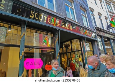 Maastricht, Netherlands - February 9. 2022: View On Store Front Of Sctoch And Soda Fashion Shop On Busy Pedastrian Zone 