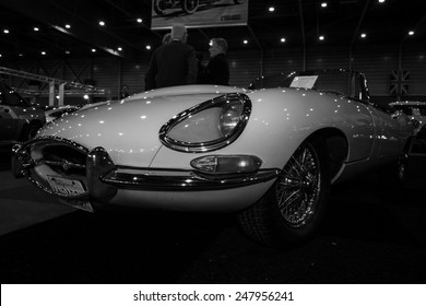 MAASTRICHT, NETHERLANDS - JANUARY 08, 2015: British sports car Jaguar E-Type Cabriolet, Serie I, 1963. Black and white. International Exhibition InterClassics & Topmobiel 2015
