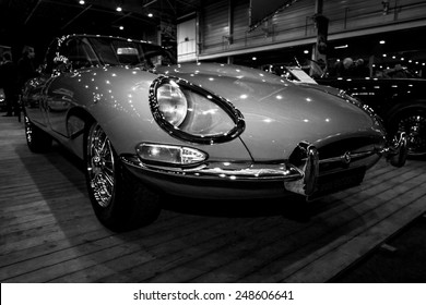 MAASTRICHT, NETHERLANDS - JANUARY 08, 2015: The sports car Jaguar E-Type Series 1. Black and white. International Exhibition InterClassics & Topmobiel 2015