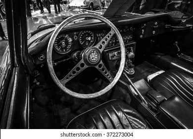 MAASTRICHT, NETHERLANDS - JANUARY 14, 2016: Cab of a sports car Jaguar E-Type. Black and white. International Exhibition InterClassics & Topmobiel 2016