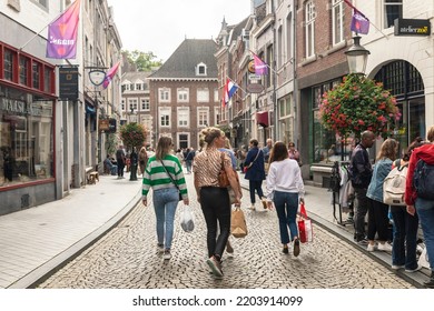 Maastricht, The Netherlands, September 11 2022. City Centre With Shops, Stores And An Outdoor Market With People Walking And Shopping On A Sunny Festive Day In Limburg, Europe