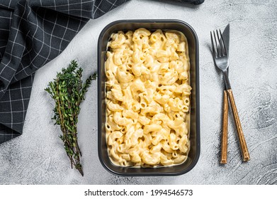 Mac And Cheese American Macaroni Pasta With Cheesy Cheddar Sauce. White Background. Top View