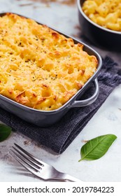 Mac And Cheese Baked In Oven With Basil Leaves