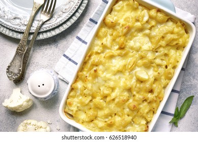 Mac And Cheese With Cauliflower In A Baking Dish On A Light Slate,stone Or Concrete Background.Top View.