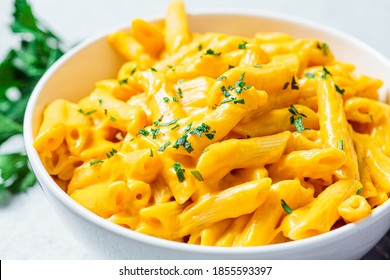 Mac And Cheese In White Bowl, Gray Background. Cheese Pasta In A Bowl.