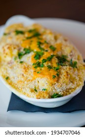 Mac N Cheese. Macaroni Mixed With Melted Cheddar Cheese, Grilled Cajun Shrimp, Crispy Bacon, Jalapeños, Spicy Corn Salsa, And Cilantro. Classic American Bar Appetizer, Loaded Mac N Cheese.