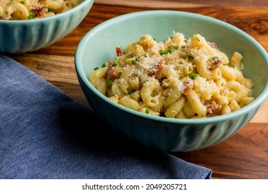 Mac N Cheese. Macaroni Mixed With Melted Cheddar Cheese, Grilled Cajun Shrimp, Crispy Bacon, Jalapeños, Spicy Corn Salsa, And Cilantro. Classic American Bar Appetizer, Loaded Mac N Cheese.