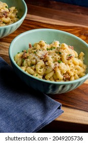 Mac N Cheese. Macaroni Mixed With Melted Cheddar Cheese, Grilled Cajun Shrimp, Crispy Bacon, Jalapeños, Spicy Corn Salsa, And Cilantro. Classic American Bar Appetizer, Loaded Mac N Cheese.