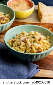 Mac N Cheese. Macaroni Mixed With Melted Cheddar Cheese, Grilled Cajun Shrimp, Crispy Bacon, Jalapeños, Spicy Corn Salsa, And Cilantro. Classic American Bar Appetizer, Loaded Mac N Cheese.