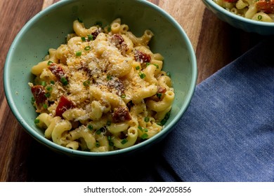 Mac N Cheese. Macaroni Mixed With Melted Cheddar Cheese, Grilled Cajun Shrimp, Crispy Bacon, Jalapeños, Spicy Corn Salsa, And Cilantro. Classic American Bar Appetizer, Loaded Mac N Cheese.