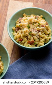 Mac N Cheese. Macaroni Mixed With Melted Cheddar Cheese, Grilled Cajun Shrimp, Crispy Bacon, Jalapeños, Spicy Corn Salsa, And Cilantro. Classic American Bar Appetizer, Loaded Mac N Cheese.