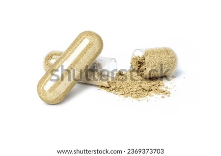 Maca powder and herbal medicine capsule isolated on white background. 