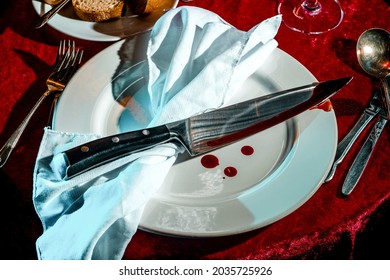 Macabre murder mystery dinner party event with bloody knife