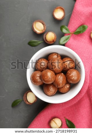 macadamia nuts on the table. High quality photo. Vertical photo format