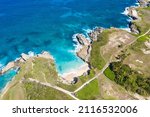 Macao beach with turquoise water and stone cliff. Dominican Republic. Aerial drone view 