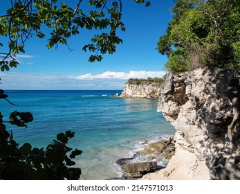 Macao beach with turquoise water and stone cliff. Dominican Republic