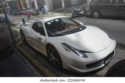 Macao, China- October 2,2022: A White Ferrari Hypercar Is Parked In Garage