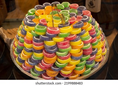 Macaron Candies On Display In The Showcase. Colorful, Sour Patch Candies Or Macarons. Selective Focus.