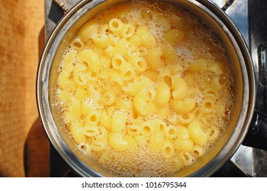 Macaroni in boiling water