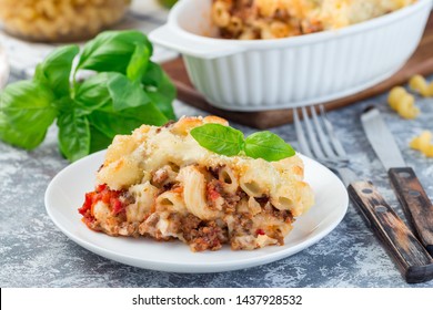 Macaroni Casserole With Ground Beef, Cheese And Tomato On A White Plate, Horizontal, Closeup