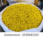 Macaroni pasta is a small, tube-shaped pasta commonly used in dishes like macaroni and cheese, pasta salads, and casseroles, appreciated for its versatility and ease of cooking.