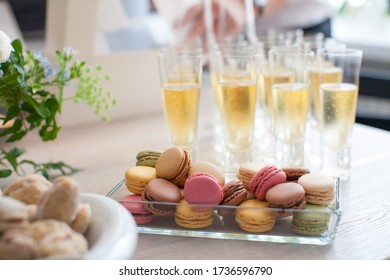 Macarons And Champagne Glasses On A Table