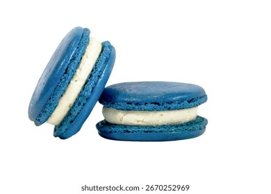 Macarons Delight: Two elegantly stacked, blue macarons, each a perfect circle of sweet, delightful simplicity. The treats features layers of blue cookie, sandwiching a rich.