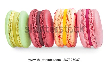 Macarons isolated on white background. French Macaron cakes or macaroons in a row. Macarons cookie.