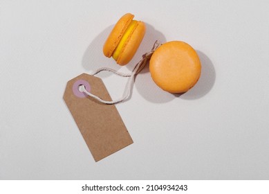 Macarons And Mockup Tag On Grey Background, St. Valentines Day Concept