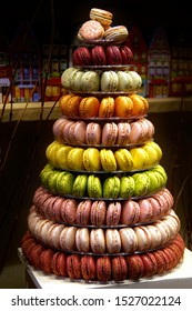 macarons pastel tones with chocolate cream are made in the form of a pyramid, traditional french colorful macarons in candy shop in the city of Bruges (Brugge), Belgium