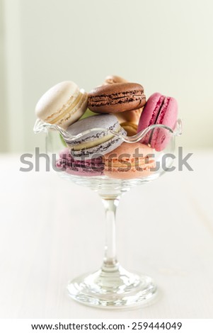 Similar – Image, Stock Photo Three colorful macarons on a plate.